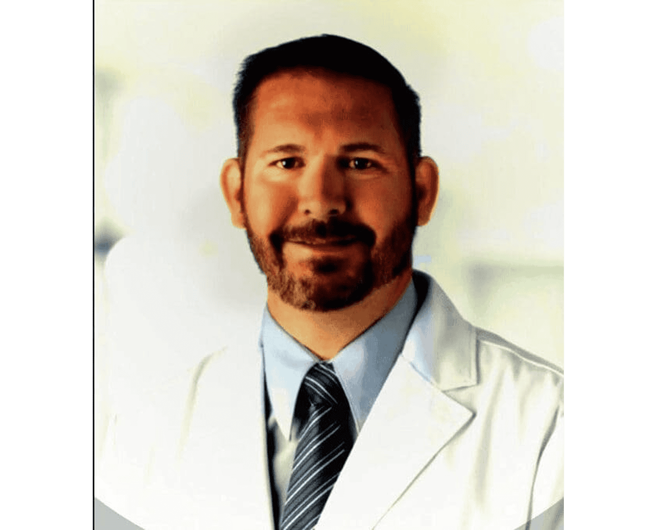 Smiling doctor in white coat